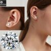 Model wearing Martini round brilliant cut cubic zirconia 3-prong solitaire diamond earrings for a sophisticated style