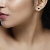 SIVYAA black solitaire princess cut diamond stud earrings, gold finish, for a daring elegant touch