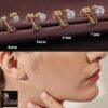 model wearing- men's single white diamond stud earrings gold finish, SIVYAA basket setting, 4 prong