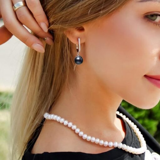 model wearing-SIVYAA Solitaire Classic Black Pearl Drop Dangle pure silver Hoop Earrings