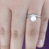 model wearing1- SIVYAA V-Shape, Pearl & Cubic Zirconia pure silver Finger Ring