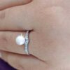 model wearing2- SIVYAA V-Shape, Pearl & Cubic Zirconia pure silver Finger Ring