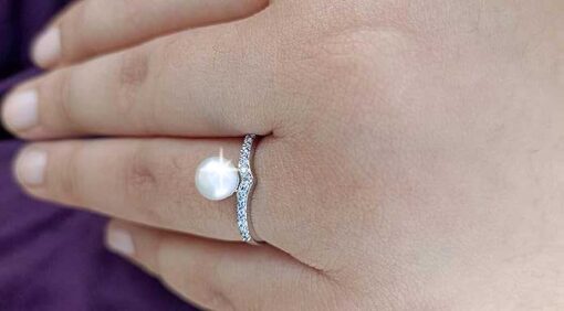 model wearing2- SIVYAA V-Shape, Pearl & Cubic Zirconia pure silver Finger Ring