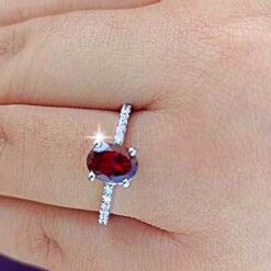 model wearing- SIVYAA Oval Cut Garnet & Cubic Zircon pure silver Finger Band
