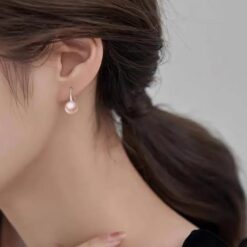 model wearing - SIVYAA Fresh Water Pink Pearl Tiny Drop Dangle pure silver Earrings