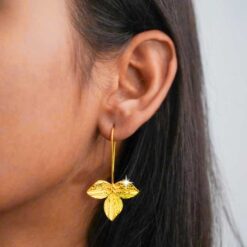 model wearing- SIVYAA handcrafted Gold Plated Tri-Petaled Flower pure silver dangle Earrings