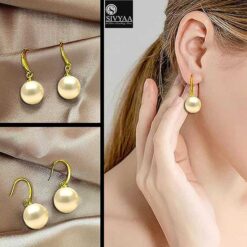 model wearing- gold finish SIVYAA Classic Gold Pearl Drop Hook Dangle Earrings