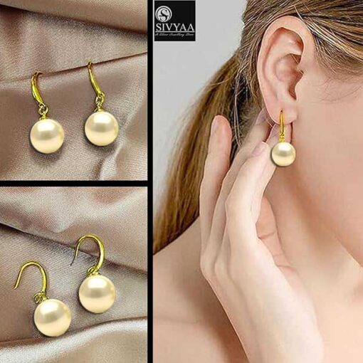 model wearing- gold finish SIVYAA Classic Gold Pearl Drop Hook Dangle Earrings