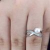 2model wearing -SIVYAA White Fresh Water Pearl & Cubic Zirconia pure silver Criss-Cross Finger Ring