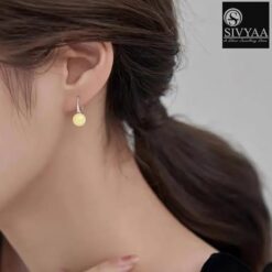 model wearing-SIVYAA Classic Gold Pearl Tiny Drop Dangle Earrings