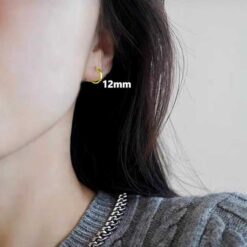 model wearing - SIVYAA flat Gold finish 2mm th silver hoop