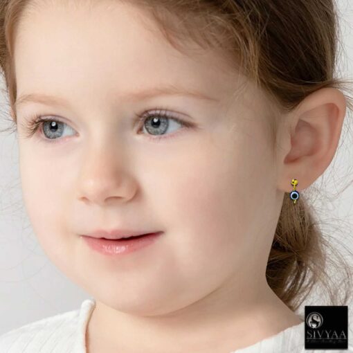kids model wearing- gold Demon Eye Pearl silver Studs -SIVYAA