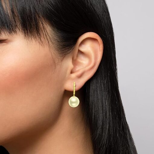 model wearing-SIVYAA gold finish Solitaire Classic Gold Pearl Drop Dangle Earrings