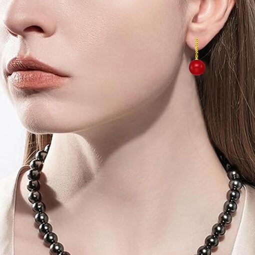 model wearing -SIVYAA gold finish Solitaire Classic Red Pearl Drop Dangle Hoop Earrings