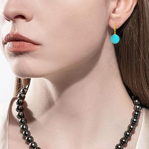 model wearing-SIVYAA gold finish Solitaire Classic Turquoise Pearl Drop Dangle Hoop