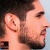 male model wearing- SIVYAA gold finish round grid textured curvish edge bali 15mm