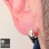 male model wearing- SIVYAA men's plain round curvish edge 13mm hoop bali earring