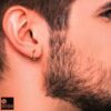 gold model wearing 2mm th 12mm men's single round silver hoop_3