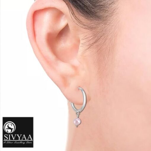 SIVYAA model wearing- drop pink pearl charm silver hoop bali