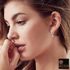 model wearing- SIVYAA drop white pearl charm pure silver hoop bali