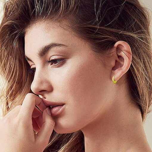 model wearing- SIVYAA gold polish Kaju Shape flower textured Bali Hoop