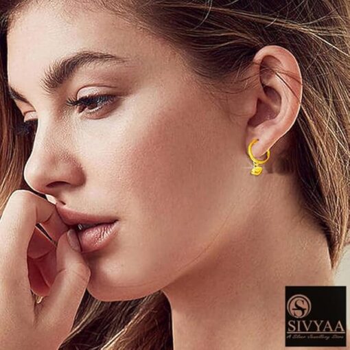 SIVYAA -model wearing- heart charm drop Textured Round Gold finish Silver hoop