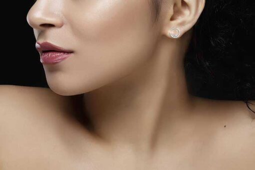 model wearing SIVYAA pure Silver Moon n Star Round CZ Stud Earring