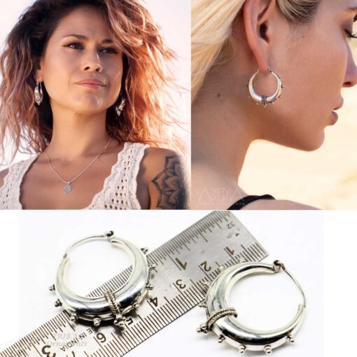 model wearing-Oxidized 925 silver tribal hoop earrings with dotted accents and crescent design