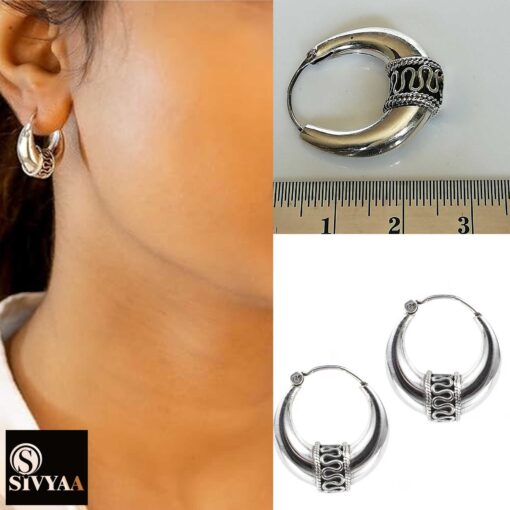 model wearing-23mm width 925 sterling silver oxidized crescent tribal hoop earrings with filigree central design
